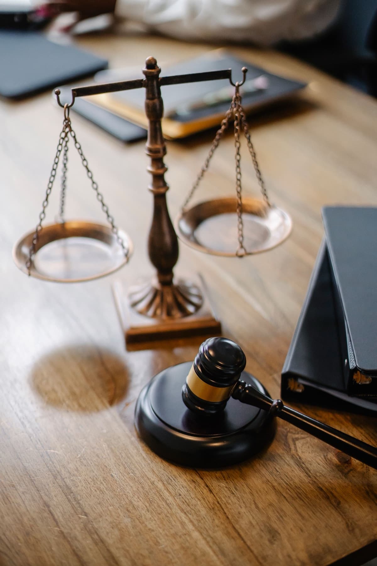 Scales of justice on a wooden desk